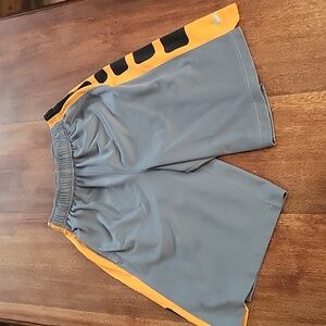 Boys size Medium Dri-fit Nike basketball shorts with pockets.